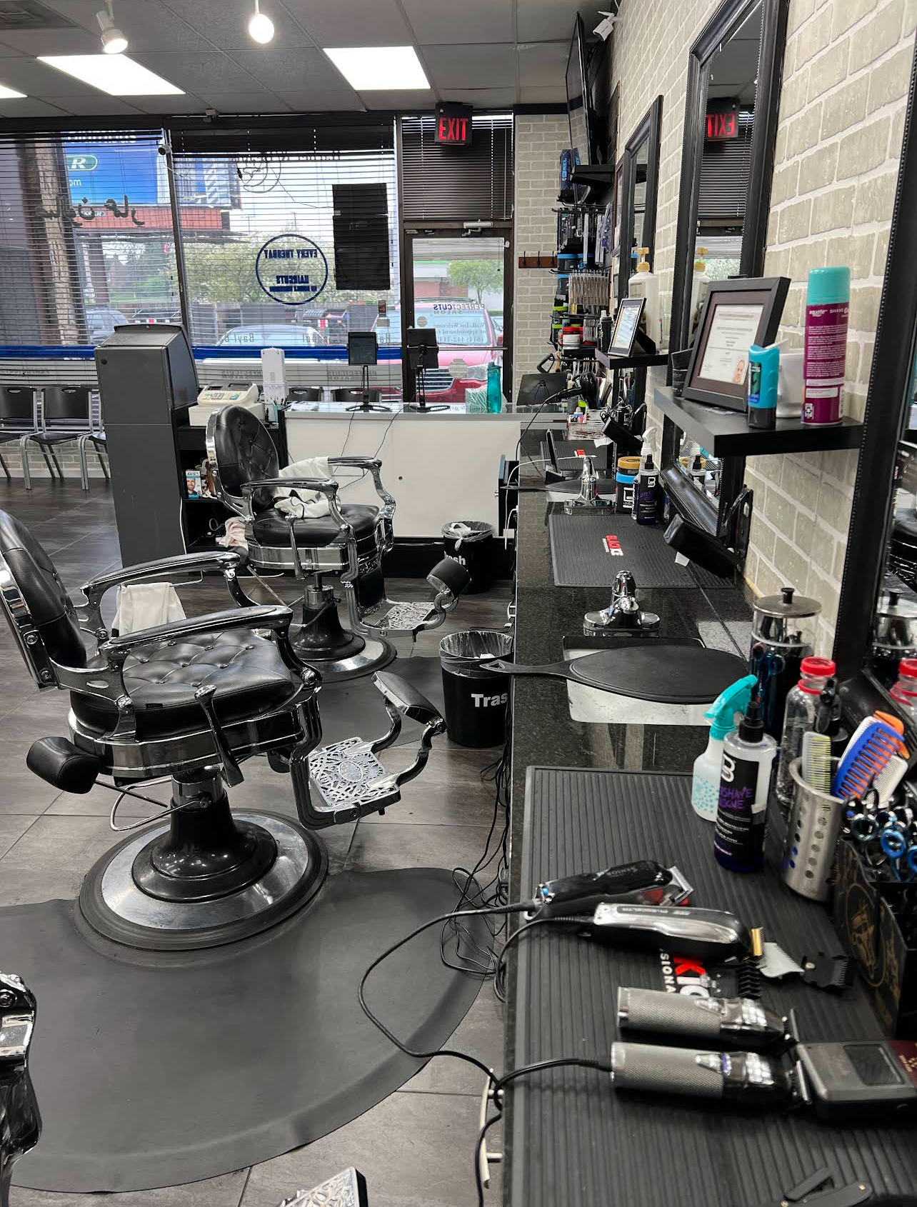 Barber stations and professional tools at Perfect Cuts Salon